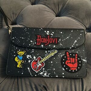 Cool rocker black wristlet w patches